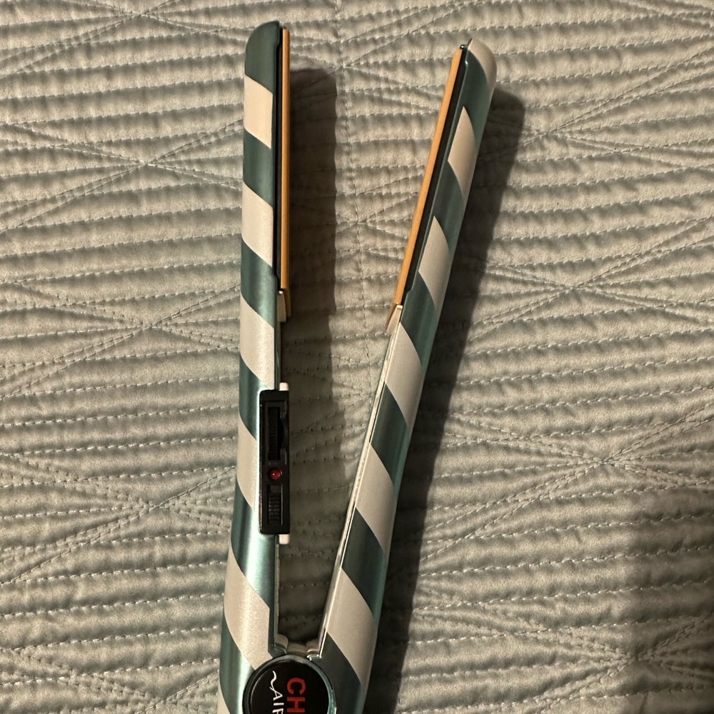 Metallic green and white stripped Chi straightener